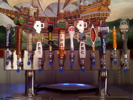 Tapper lineup of craft beers at the marina