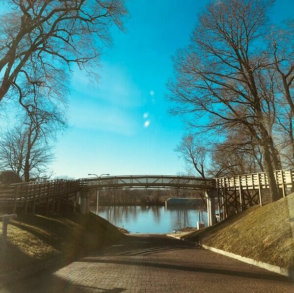 Footbridge over Main Street at Riverfront Park on a beautiful sunny and warm winter day
